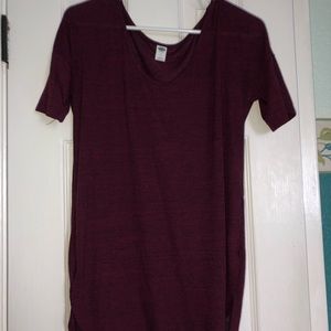 A light weight maroon short sleeve top